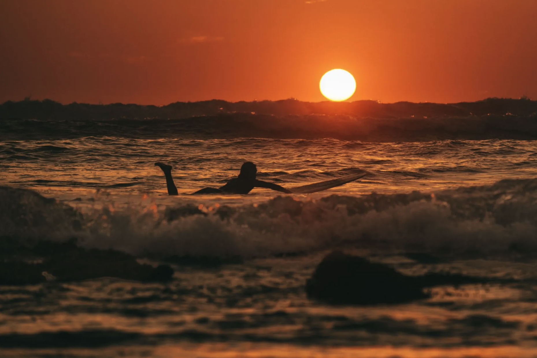 Pacific Ritual — surfer at golden hour